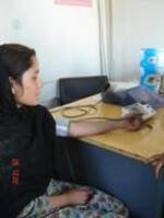 woman getting blood pressure
